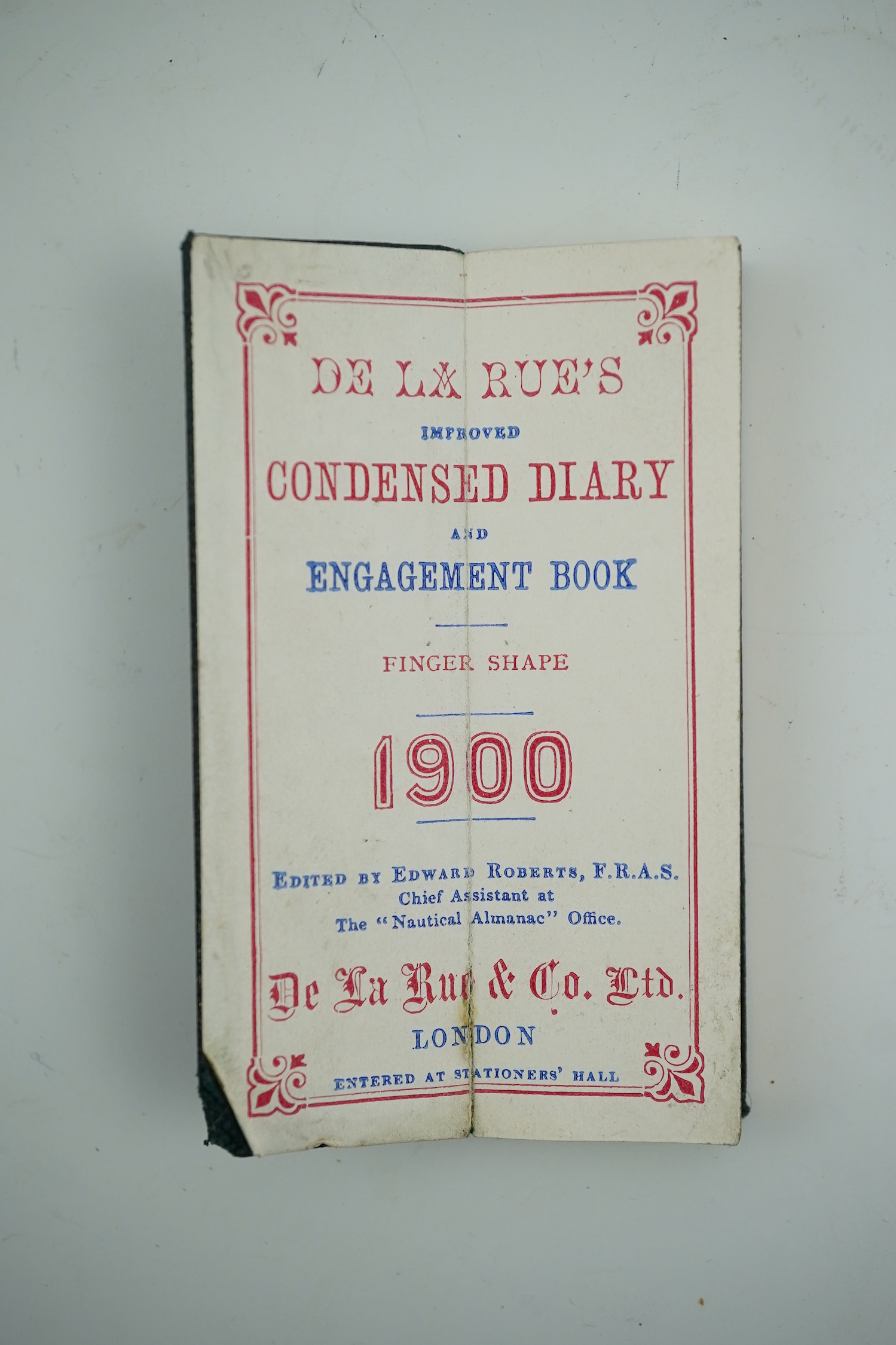 A De La Rue's Condensed Diary for 1900, unused, in original gilt morocco sheath, 8cm high. Condition - good